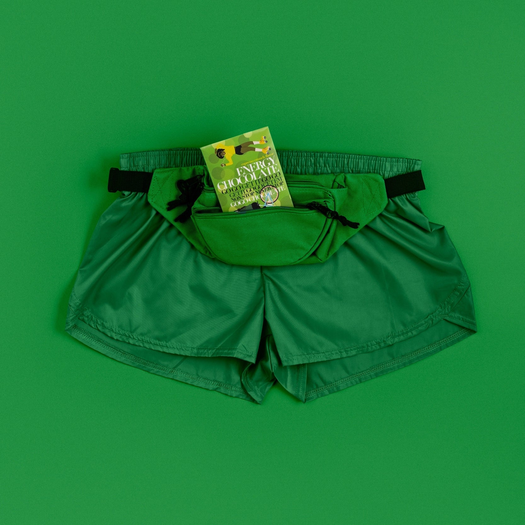 Funco energy chocolate in a bum bag on green boxer shorts
